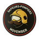 LOT DE 50 ECUSSONS MOVEMBER ROUGE PVC